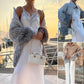 Trui van gebreid materiaal met uniforme glitter 