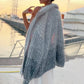 Trui van gebreid materiaal met uniforme glitter 