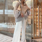 Trui van gebreid materiaal met uniforme glitter 